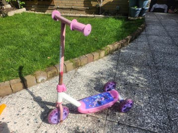 Roze kinderstep met 3 wielen