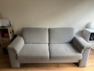 GRATIS grijze stoffen bank