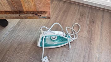 Gratis strijkijzer en strijkplank zonder hoes