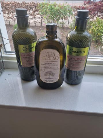 Sfeervolle olijfolieflessen voor decoratie