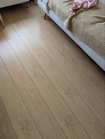 Oude laminaatvloer, ongeveer 20-25 m²