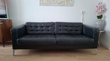 Gratis zwart leren bank