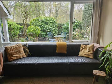 Zwart/donker grijze leren design bank Gratis