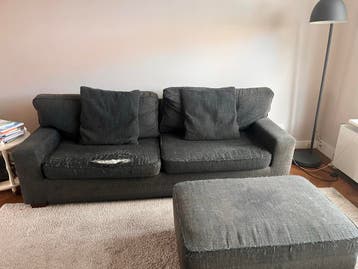 Grijze 3-zits bank met hocker - 235 cm breed