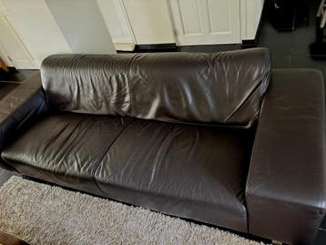 Zwarte leren vierzitsbank