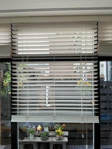 Houten jaloezieën gratis ophalen