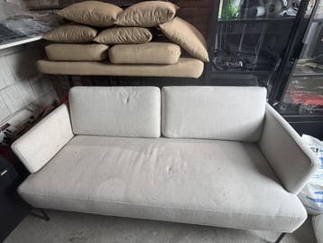 Gratis 2-zitsbank met poef