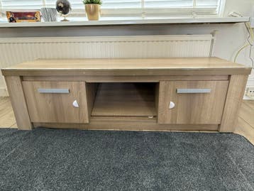 TV cabinet with storage space, light wood color