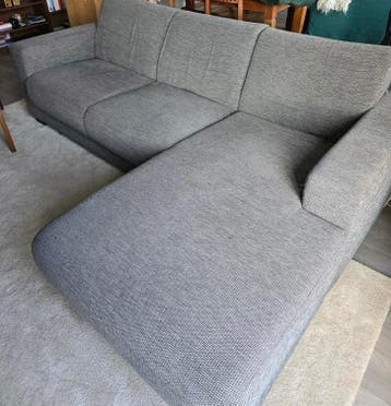 Grijze hoekbank in gebruikte staat GRATIS