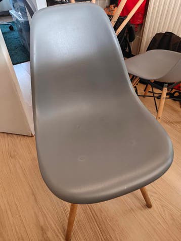 Set van 4 grijze kuipstoelen voor de eetkamer