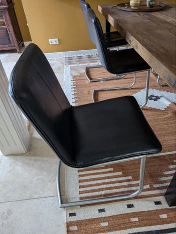 Zes GRATIS eetkamerstoelen echt leer rvs onderstel