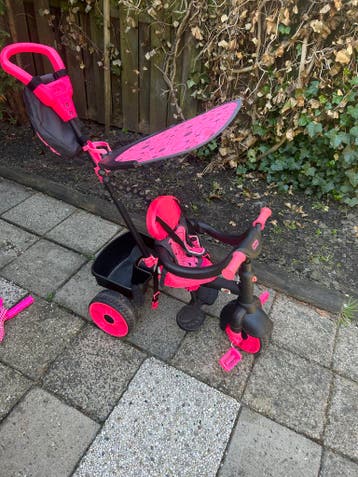 Roze Kinderfiets/driewieler met duwstang en zonnekap