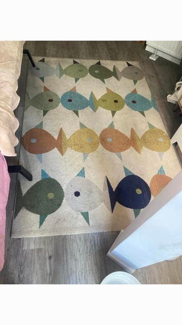 Dik tapijt met vissenpatroon