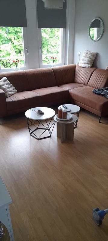 Comfortabele bruine hoekbank - Zo goed als nieuw