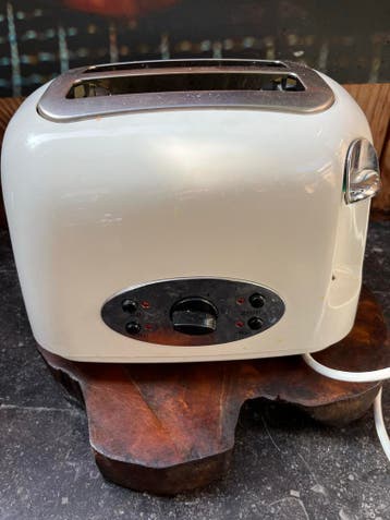 Crèmekleurige broodrooster met 2 sleuven