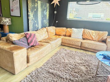 Grote leren hoekbank gratis ophalen