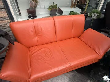 Montel 2-zitsbank oranje leer.