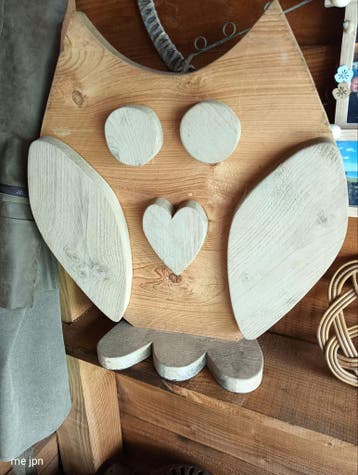 Uil gemaakt van hout . ongeveer halve meter ,gratis