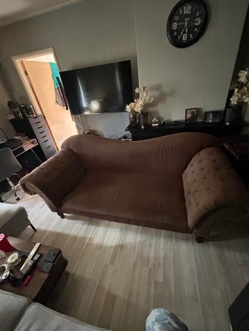 Comfortabele bruine driezitsbank