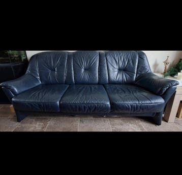 Donkerblauwe kunstleren bank (210cm) en fauteuil