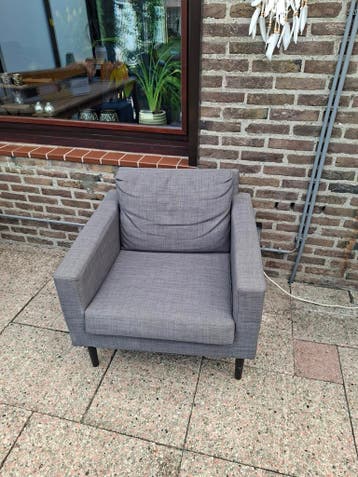 Comfortabele grijze fauteuil