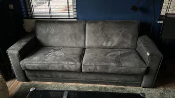 Grijze tweepersoonsbank - Gebruikt
