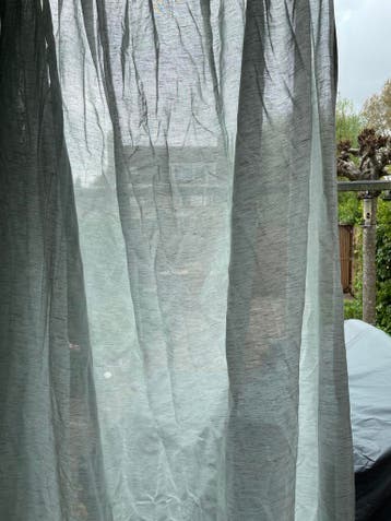 Lichtgroene gordijnen met dubbele plooi