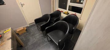 Set van 4 zwarte leren eetkamerstoelen