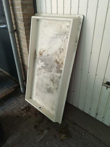 Gratis lekbak voor twee wasmachines (kunststof/multiplex)