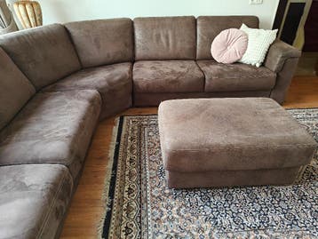 Royale hoekbank met  poef