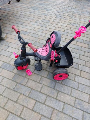 Roze Driewieler met duwstang