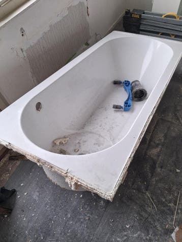 Used white bathtub