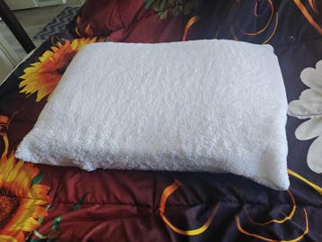 Beenligkussen met zachte witte hoes