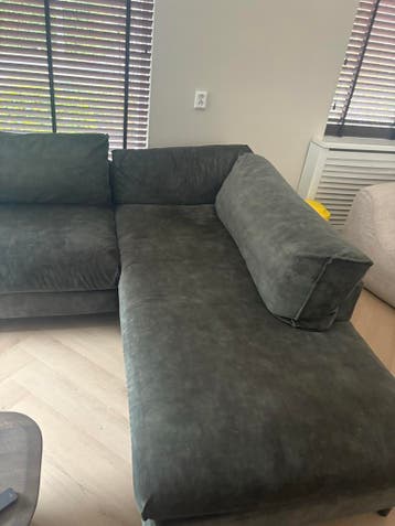 Comfortabele donkergroene hoekbank