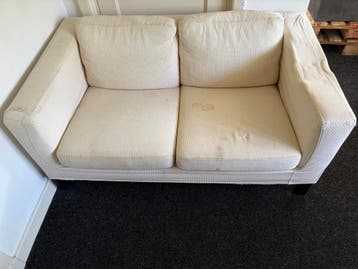 Witte bank met vlekken - Den Bosch