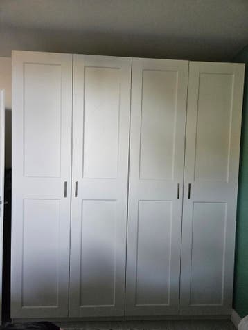 Witte kledingkast met lades en hangruimte