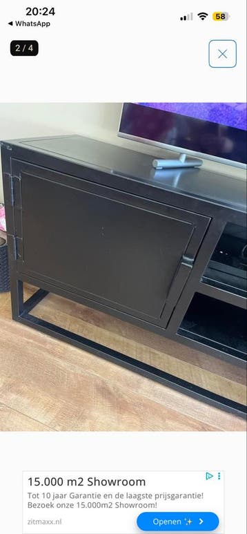 Gratis: Stoer zwart stalen televisiemeubel Gigameubel