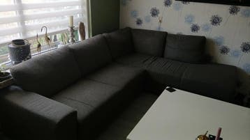 Comfortabele bruine hoekbank