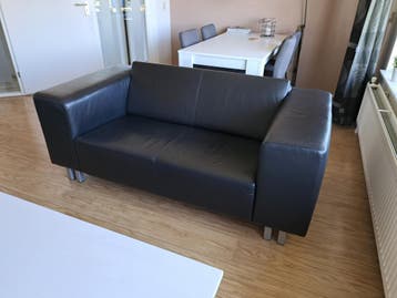 Gratis af te halen. Montel zwart leren 2 zits bank