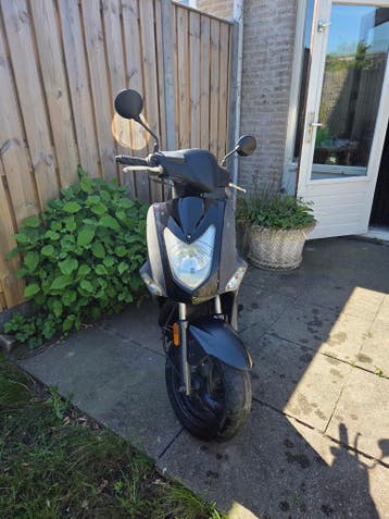 Gratis(alleen overschrijving)Kymco Agility 50 - Zwart