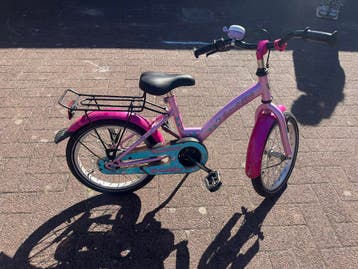 Gratis leuke, gebruikte roze kinderfiets (18inch)