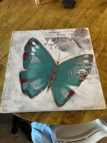 Schilderij met vlinder.