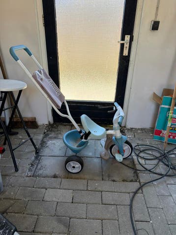 Smoby driewieler met duwstang