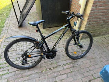 Mountainbike Rockrider met defecte vrijloop