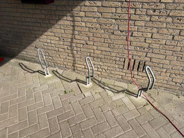 GRATIS Drie gebruikte fietsenrekken te koop