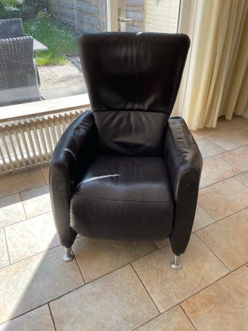 Comfortabele donkerbruine leren fauteuil