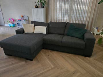 Comfortabele hoekbank met lichte gebruikssporen
