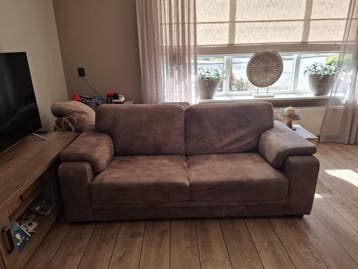 Gratis Comfortabele 2-zitsbank en een 2.5 zits bank.