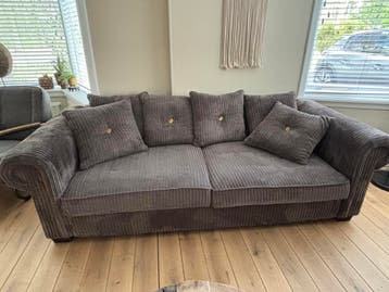 Taupe kleur 2 1/2 zit en love seat