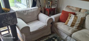 Comfortabele beige hoekbank met losse fauteuil